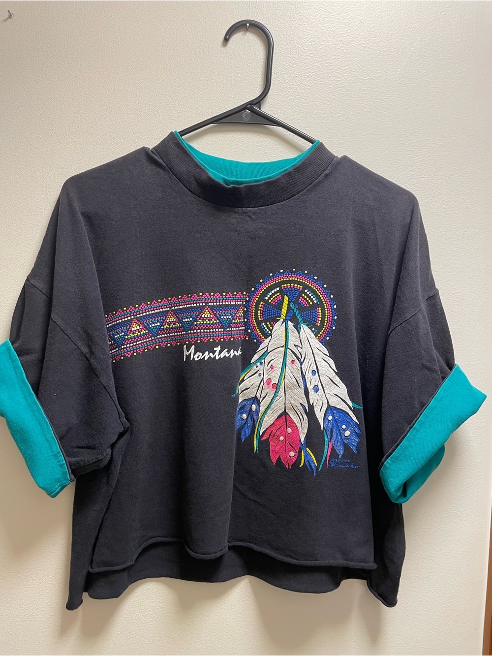 Black Short-Sleeve Tee with Feather Graphic and Teal Accents